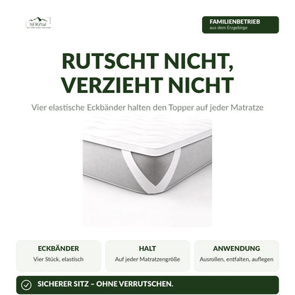 Vier elastische Eckbänder halten den hERZtal CloudTop Topper auf jeder Matratze